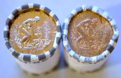 2 $25 Rolls of Mixed Unc $1 Coins