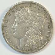 Much higher graded 1891-CC Morgan Silver Dollar