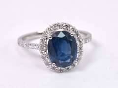 Extravagant Sapphire and Diamond Ring in 18K White Gold