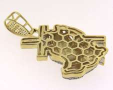 Striking 10kt Diamond Religious Pendant