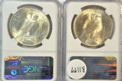 2 near Gem BU 1922 Peace Silver Dollars. NGC MS64