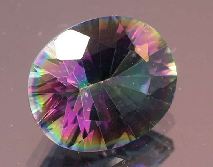 Rainbow color 3.96ct concave cut Mystic Quartz