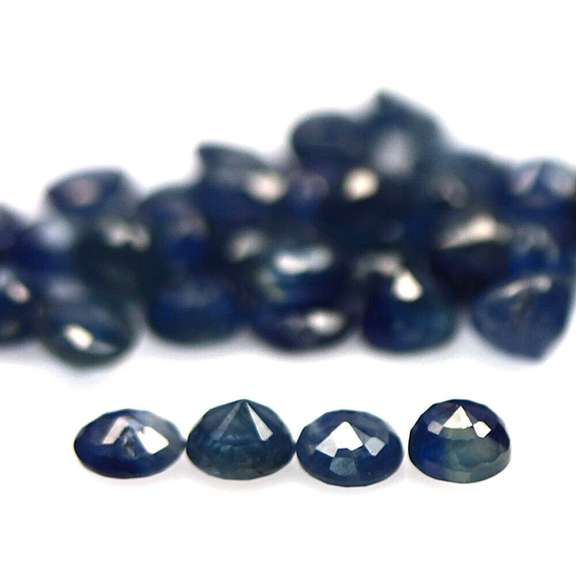 Heated only! 9.37ct deep blue sapphire set