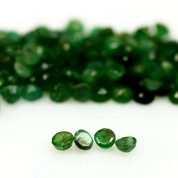 Unheated 8.94ct rich green Emerald set