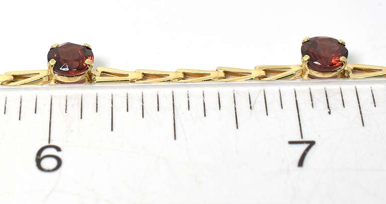 Entrancing 5-Stone Garnet Bracelet in 14KT Yellow Gold