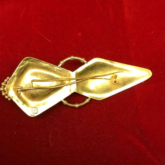 21k ladies brooch with gem