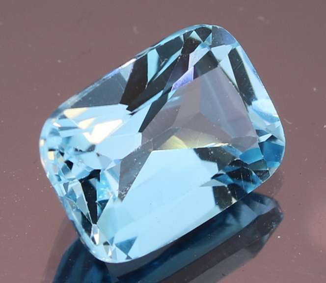 Ravishing 8.92ct 14x10mm cushion cut Topaz