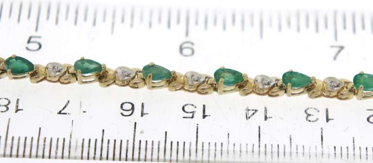 Fabulous Diamond and Pear Emerald Tennis Bracelet