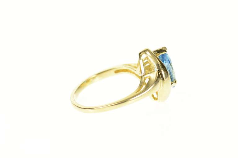 14K Yellow Gold Pear Blue Topaz Diamond Accent Bypass Ring