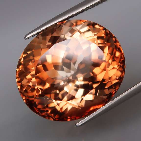 Sublime 26.85ct peach amber Imperial Topaz