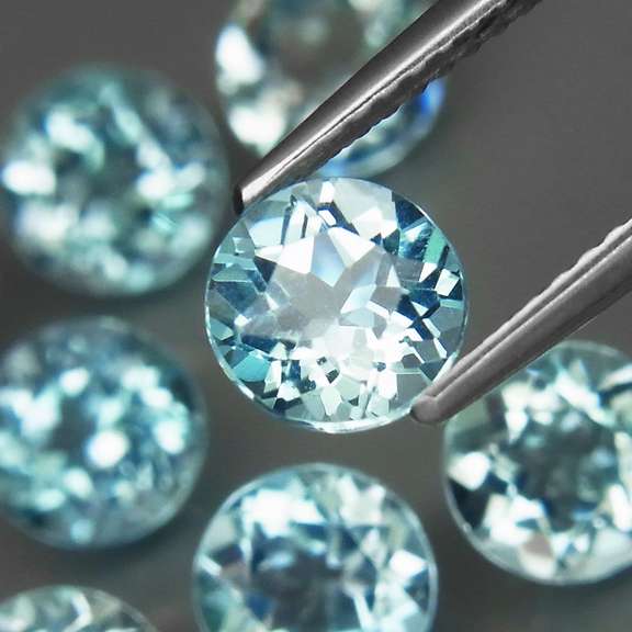 High fire 8.13ct collection of Topaz solitaires