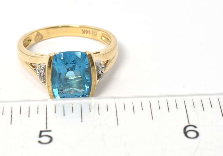 Eye-Catching Blue Topaz & Diamond Ring in 14KT Yellow Gold