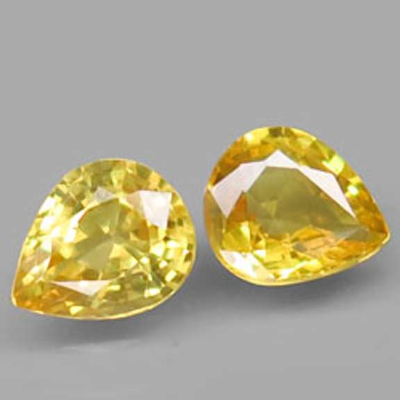 Vivid! .95ct pair of golden Songean Sapphires