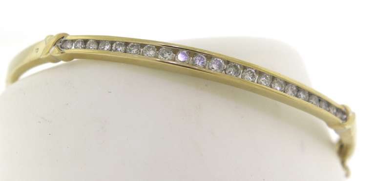 Favorite Diamond Channel Set Yellow Gold Bangle