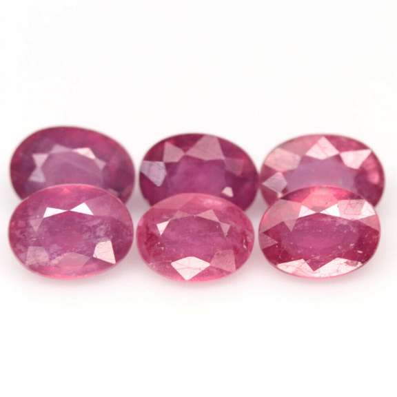 Heavy 10.27ct oval cut Ruby set