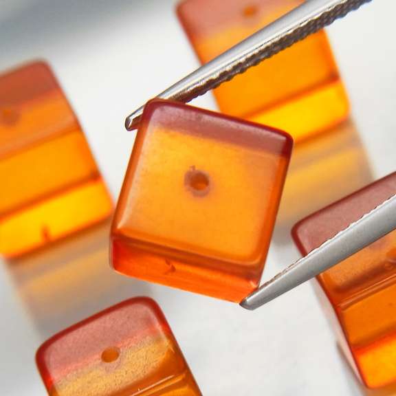 Really cool 13.48ct 8x8mm natural Amber set