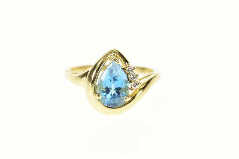 14K Yellow Gold Pear Blue Topaz Diamond Accent Bypass Ring