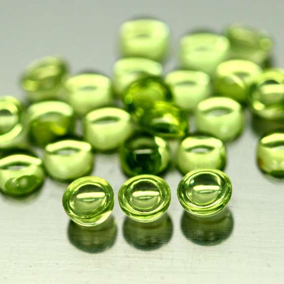 Pristine 8.09ct 24pc lime green Peridot set