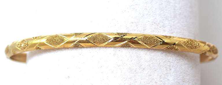 Understated Laser-Etched Bangle Bracelet in Yellow Gold