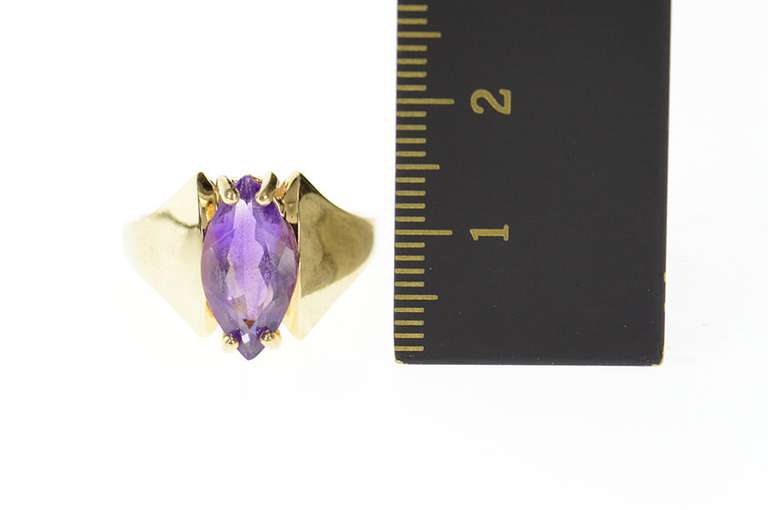10K Yellow Gold Graduated Marquise Amethyst Solitaire Ring