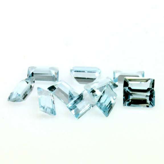 Vivid! 4.16ct emerald cut Swiss blue Topaz set