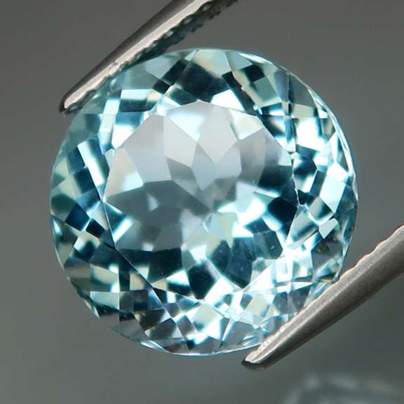 High fire! Full body flashing eye clean 8ct Topaz solitaire