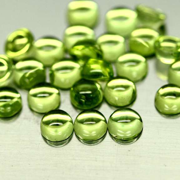 Pristine 8.09ct 24pc lime green Peridot set