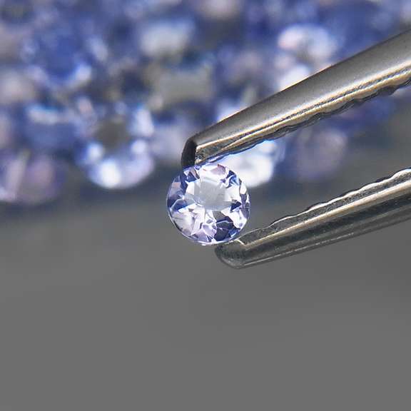 Heavy flashing 3.85ct diamond cut Tanzanite set
