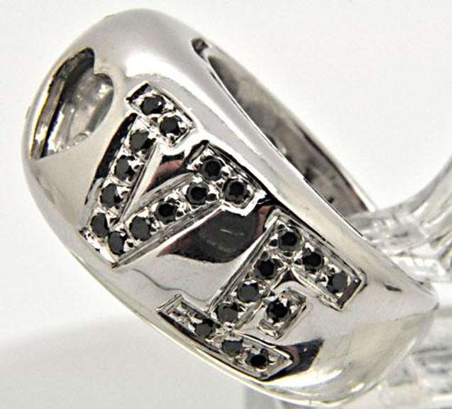 LADIES 18 KT WHITE GOLD DIAMOND 'LOVE' RING.