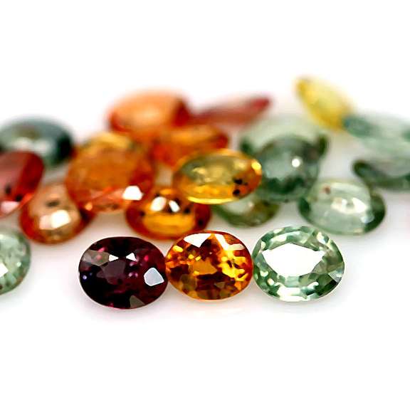 Heated only! 7.96ct fancy color Sapphire set