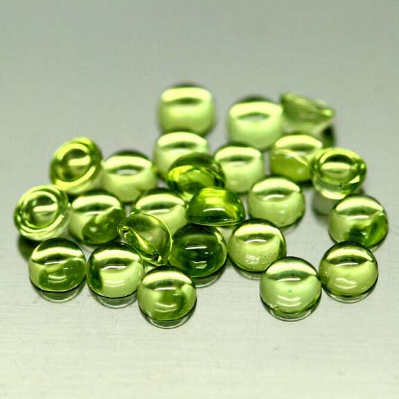 Pristine 8.09ct 24pc lime green Peridot set