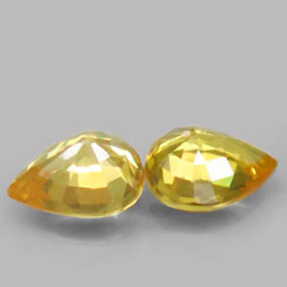 Vivid! .95ct pair of golden Songean Sapphires