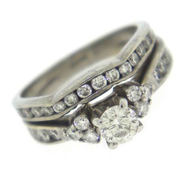 Wonderful 14kt WG Channel Set Bridal Set with Round Cut Diamond Center