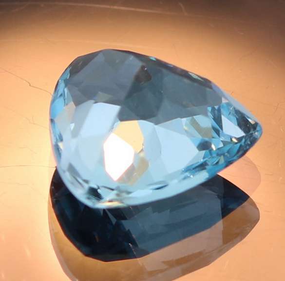 High fire 6.70ct trillion cut Swiss blue Topaz