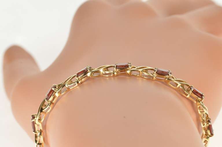 10K Yellow Gold Oval Garnet Criss Cross X Link Tennis Bracelet