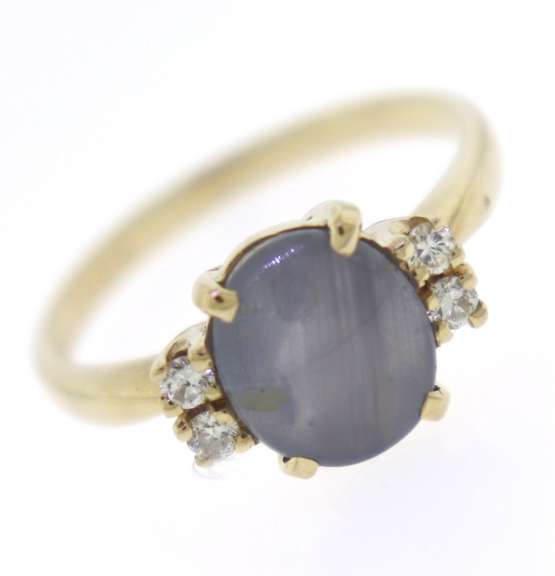 Fantastic 14kt Yellow Gold Oval Star Sapphire and Diamond Ring