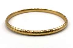Trendy 14kt Hammered Gold Bangle