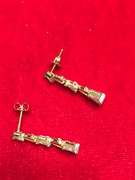 14k gold diamond earrings.