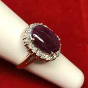 14K GOLD LADIES DIAMOND AND RUBY RING.