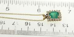 Wonderful Yellow Gold Emerald and Diamond Halo Necklace