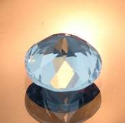 Glittering 4.47ct 10mm sky blue Topaz solitaire
