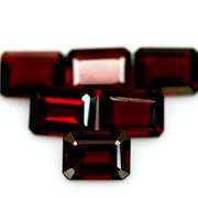 Heavy 10.41ct untreated emerald cut Garnet set
