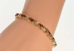 10K Yellow Gold Oval Garnet Criss Cross X Link Tennis Bracelet