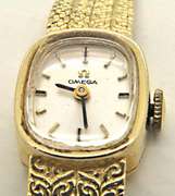 LADIES 14 KT GOLD OMEGA WATCH