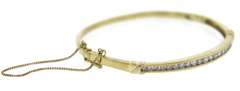 Favorite Diamond Channel Set Yellow Gold Bangle