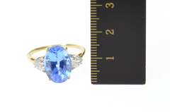10K Yellow Gold Oval Three Stone Syn. Sapphire Trillion CZ Ring