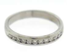 Elegant White Gold Channel Set Diamond Band