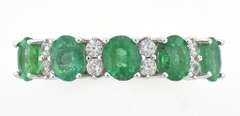 Alluring Emerald & White Sapphire Ring in Sterling Silver