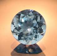 Glittering 4.47ct 10mm sky blue Topaz solitaire