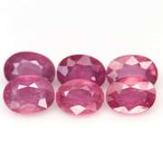 Heavy 10.27ct oval cut Ruby set